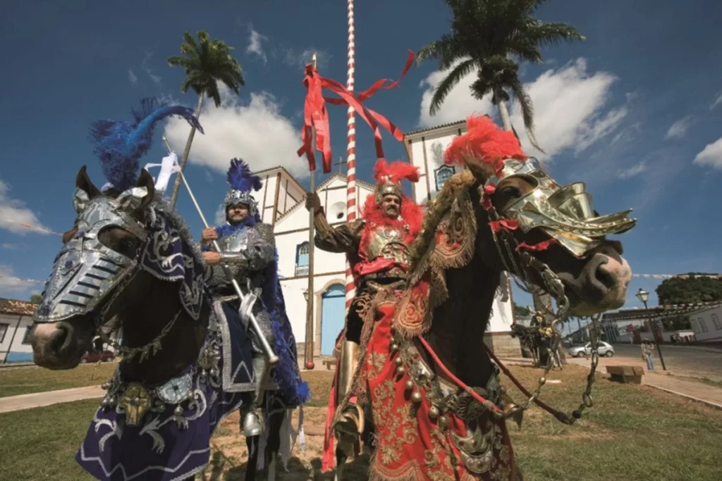 Mounted participants in the vibrant Cavalhadas festival, a cultural highlight in Pirenópolis.