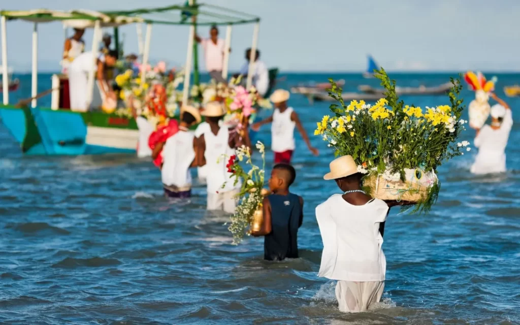Offerings to IemanjĂ¡ on the beach in Salvador